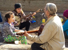 Photo of children playing music
